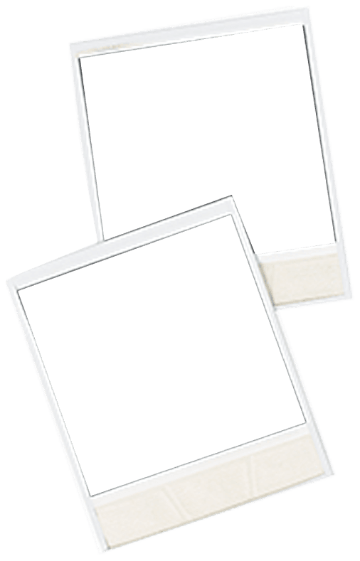 Two empty polaroid frames, pinned and waiting for photographs